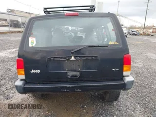 1998 Jeep Cherokee Sport z VIN 1J4FJ68S7WL264849, wystawiony jako IAAI lot #41931068 z przebiegiem Nie podano mil oraz . Historia ofert i sprzedaży dostępna na DreamBid. Obrazek 16.