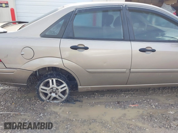 2004 Ford Focus SE with VIN 1FAFP343X4W156745, listed as a IAAI auction lot 42501461 with 289,925 mi miles and . Bid and sale history available at DreamBid. Image 6.