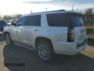 2015 GMC Yukon Denali with VIN 1GKS2CKJ7FR183710, listed as a Copart auction lot 49074135 with 230,526 mi miles and Salvage Title. Bid and sale history available at carsss.com. Image 2.