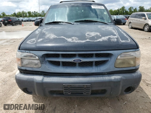 1999 Ford Explorer Sport z VIN 1FMYU22X9XUC03819, wystawiony jako Copart lot #69840564 z przebiegiem 214 315 mil mil oraz Szkoda całkowita • Salvage title. Historia ofert i sprzedaży dostępna na DreamBid. Obrazek 5.