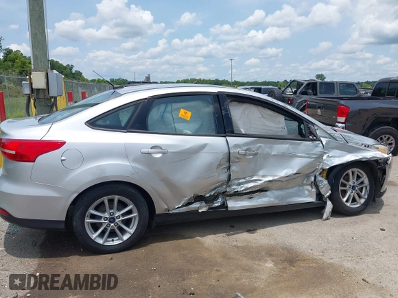 2016 Ford Focus SE with VIN 1FADP3F26GL351775, listed as a IAAI auction lot 42424733 with 164,886 mi miles and . Bid and sale history available at DreamBid. Image 13.