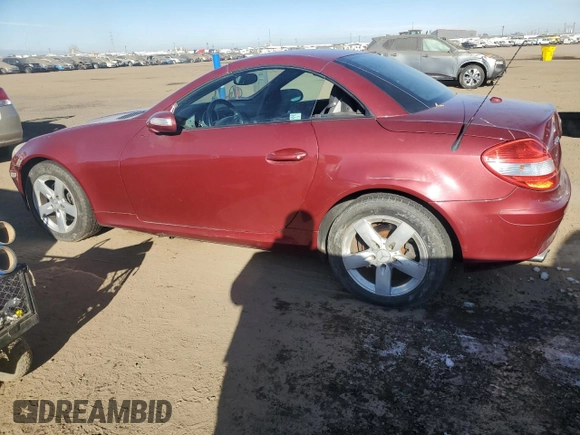 2007 Mercedes-Benz SLK-Class 3.0L with VIN WDBWK54FX7F137632, listed as a Copart auction lot 85145504 with 124,940 mi miles and Clean Title. Bid and sale history available at carsss.com. Image 2.