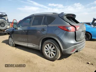 2014 Mazda CX-5 Sport z VIN JM3KE4BE1E0359446, wystawiony jako Copart lot #54562545 z przebiegiem 128 150 mil mil oraz Szkoda całkowita • Salvage title. Historia ofert i sprzedaży dostępna na DreamBid. Obrazek 2.