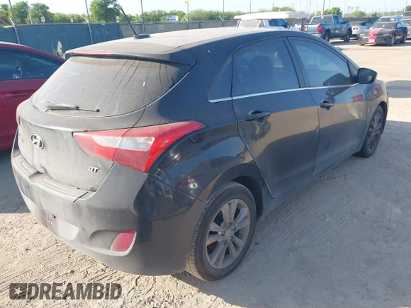 2014 Hyundai Elantra GT with VIN KMHD35LH3EU234636, listed as a IAAI auction lot 41998223 with 213,434 mi miles. Bid and sale history available at carsss.com. Image 4.
