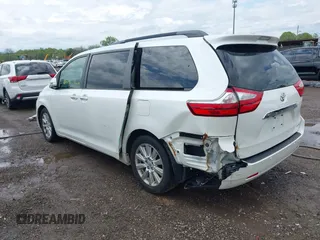 2015 Toyota Sienna XLE with VIN 5TDYK3DC3FS529256, listed as a IAAI auction lot 42172570 with 163,725 mi miles and . Bid and sale history available at carsss.com. Image 3.