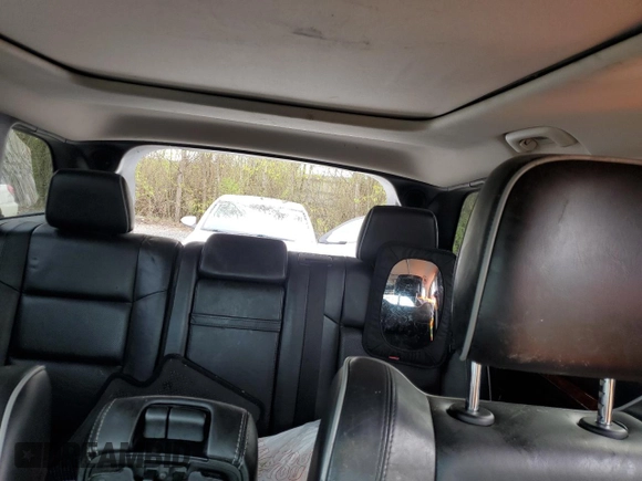 2013 Jeep Grand Cherokee Overland with VIN 1C4RJFCGXDC643802, listed as a Copart auction lot 52429535 with 122,014 mi miles and Salvage Title. Bid and sale history available at carsss.com. Image 10.