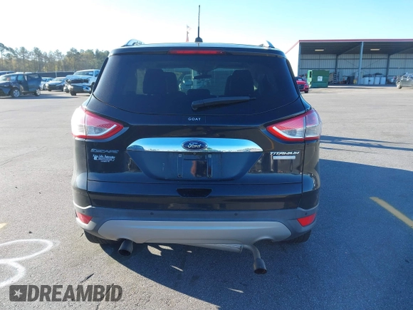 2016 Ford Escape Titanium with VIN 1FMCU0JX3GUA90420, listed as a IAAI auction lot 41850537 with 115,770 mi miles. Bid and sale history available at carsss.com. Image 16.