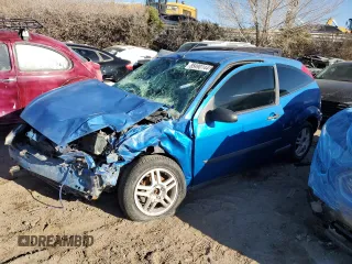 2000 Ford Focus ZX3 with VIN 3FAHP3132YR210710, listed as a Copart auction lot 85490144 with 126,654 mi miles and Salvage title. Bid and sale history available at DreamBid. Image 1.