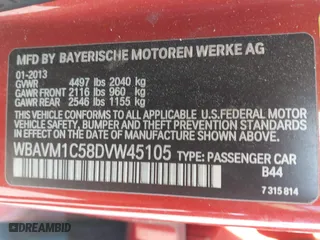 2013 BMW X1 28i with VIN WBAVM1C58DVW45105, listed as a IAAI auction lot 42049919 with 141,020 mi miles. Bid and sale history available at carsss.com. Image 9.