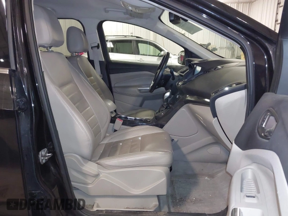 2014 Ford Escape Titanium with VIN 1FMCU9J95EUD85537, listed as a IAAI auction lot 41472236 with 154,796 mi miles. Bid and sale history available at carsss.com. Image 5.