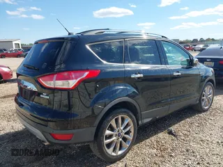 2016 Ford Escape SE with VIN 1FMCU0GX6GUA04203, listed as a IAAI auction lot 41840108 with 85,459 mi miles. Bid and sale history available at carsss.com. Image 4.