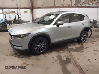 2021 Mazda CX-5 Grand Touring with VIN JM3KFADMXM1318015, listed as a IAAI auction lot 41221528 with 79,473 mi miles. Bid and sale history available at carsss.com. Image 17.