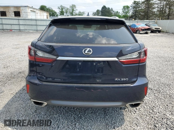 2018 Lexus RX 350 with VIN 2T2BZMCA6JC149235, listed as a Copart auction lot 59939505 with 214,676 mi miles and Salvage title. Bid and sale history available at DreamBid. Image 6.
