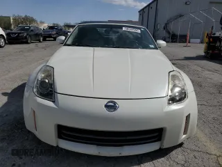 2006 Nissan 350Z Touring z VIN JN1AZ36A56M450937, wystawiony jako Copart lot #56544955 z przebiegiem 102 027 mil mil oraz Szkoda całkowita • Salvage title. Historia ofert i sprzedaży dostępna na DreamBid. Obrazek 5.