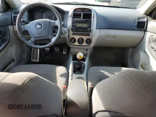 2005 Kia Spectra with VIN KNAFE161155153320, listed as a Copart auction lot 55231794 with 149,492 mi miles and Salvage Title. Bid and sale history available at carsss.com. Image 8.