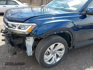 2023 Volkswagen Atlas SE with VIN 1V2HR2CA2PC505456, listed as a IAAI auction lot 42032269 with 7,918 mi miles and . Bid and sale history available at DreamBid. Image 18.