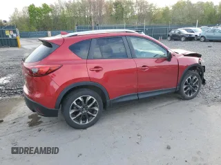 2016 Mazda CX-5 Grand Touring with VIN JM3KE4DY6G0753826, listed as a Copart auction lot 55391555 with 96,852 mi miles and Salvage Title. Bid and sale history available at DreamBid. Image 3.