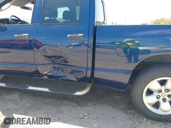 2005 Dodge 1500 SLT with VIN 1D7HA18N95S277995, listed as a IAAI auction lot 41841508 with 212,109 mi miles. Bid and sale history available at carsss.com. Image 6.