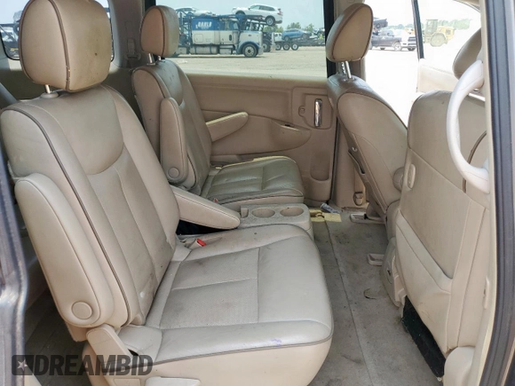 2014 Nissan Quest SV z VIN JN8AE2KP0E9101509, wystawiony jako Copart lot #58003325 z przebiegiem 198 287 mil mil oraz Czysty tytuł • Clean title. Historia ofert i sprzedaży dostępna na DreamBid. Obrazek 11.