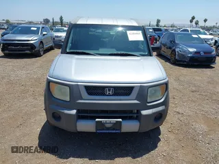 2003 Honda Element EX z VIN 5J6YH28573L048728, wystawiony jako IAAI lot #42484065 z przebiegiem 245 321 mil mil oraz . Historia ofert i sprzedaży dostępna na DreamBid. Obrazek 12.