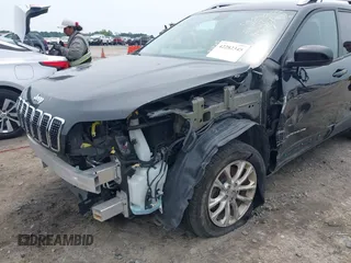 2020 Jeep Cherokee Latitude with VIN 1C4PJLCB5LD539057, listed as a IAAI auction lot 42282345 with 68,676 mi miles and . Bid and sale history available at DreamBid. Image 6.