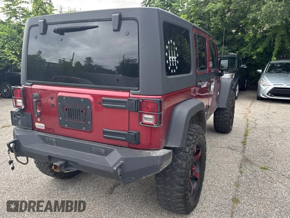 2012 Jeep Wrangler Unlimited Sport with VIN 1C4BJWDG5CL289329, listed as a Copart auction lot 65816775 with 152,632 mi miles and Clean title. Bid and sale history available at DreamBid. Image 4.
