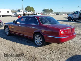 2004 Jaguar XJ VDP with VIN SAJWA74C94SG21255, listed as a IAAI auction lot 41224294 with 141,978 mi miles. Bid and sale history available at carsss.com. Image 3.