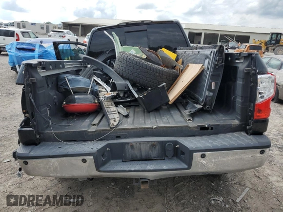 2016 Nissan Titan SL z VIN 1N6BA1F22GN504550, wystawiony jako Copart lot #56616955 z przebiegiem 176 020 mil mil oraz Szkoda całkowita • Salvage title. Historia ofert i sprzedaży dostępna na DreamBid. Obrazek 6.