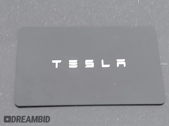2020 Tesla Model 3 Standard Range Plus with VIN 5YJ3E1EA1LF799766, listed as a IAAI auction lot 41386508 with 90,000 mi miles. Bid and sale history available at carsss.com. Image 11.