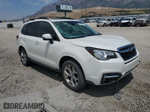2018 Subaru Forester Touring with VIN JF2SJAWC4JH435749, listed as a Copart auction lot 63526465 with 143,029 mi miles and Salvage title. Bid and sale history available at DreamBid. Image 4.