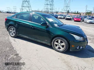 2014 Chevrolet Cruze 1LT z VIN 1G1PC5SB5E7187521, wystawiony jako IAAI lot #41914482 z przebiegiem 149 217 mil mil oraz . Historia ofert i sprzedaży dostępna na DreamBid. Obrazek 1.