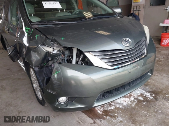 2013 Toyota Sienna XLE with VIN 5TDDK3DC9DS061903, listed as a IAAI auction lot 42067873 with 166,341 mi miles and . Bid and sale history available at DreamBid. Image 6.