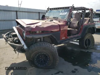 1999 Jeep Wrangler Sport with VIN 1J4FY19S5XP493117, listed as a Copart auction lot 57490792 with Not provided miles and Salvage title. Bid and sale history available at DreamBid. Image 2.