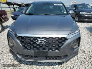 2019 Hyundai Santa Fe SE with VIN 5NMS23AD5KH104668, listed as a Copart auction lot 63483564 with 63,468 mi miles and Salvage Title. Bid and sale history available at carsss.com. Image 5.