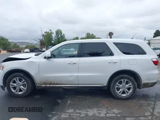 2013 Dodge Durango SXT z VIN 1C4RDHAG7DC694986, wystawiony jako IAAI lot #42181381 z przebiegiem 170 669 mil mil oraz . Historia ofert i sprzedaży dostępna na DreamBid. Obrazek 14.