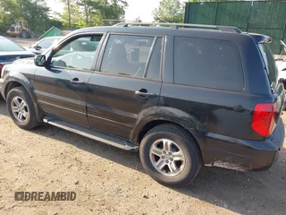 2003 Honda Pilot EX z VIN 2HKYF18763H605799, wystawiony jako IAAI lot #42478003 z przebiegiem 216 563 mil mil oraz . Historia ofert i sprzedaży dostępna na DreamBid. Obrazek 3.