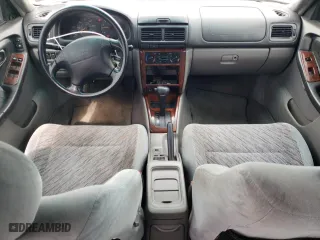 1999 Subaru Forester S with VIN JF1SF6555XH730230, listed as a Copart auction lot 71795924 with 103,455 mi miles and Salvage Title. Bid and sale history available at carsss.com. Image 8.