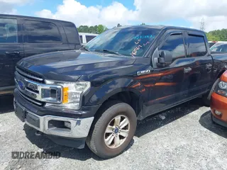 2019 Ford F-150 XL with VIN 1FTEW1E56KFA63764, listed as a IAAI auction lot 42410872 with 124,648 mi miles and . Bid and sale history available at DreamBid. Image 2.