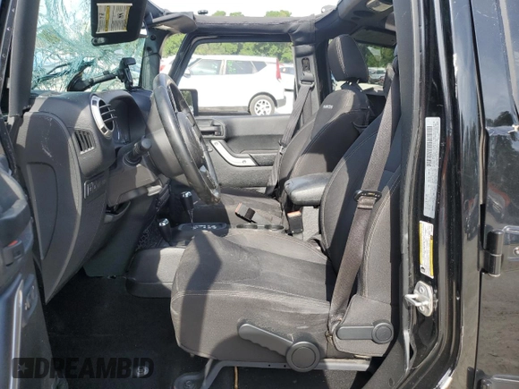 2016 Jeep Wrangler Unlimited Rubicon with VIN 1C4BJWFG7GL320650, listed as a Copart auction lot 53900195 with 77,620 mi miles and Salvage title. Bid and sale history available at DreamBid. Image 7.