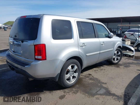 2012 Honda Pilot EX-L with VIN 5FNYF4H54CB033968, listed as a IAAI auction lot 41829628 with 265,486 mi miles and . Bid and sale history available at DreamBid. Image 4.