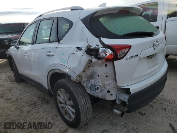 2015 Mazda CX-5 Sport with VIN JM3KE2BE1F0456264, listed as a Copart auction lot 86103704 with 178,017 mi miles and Salvage title. Bid and sale history available at DreamBid. Image 2.
