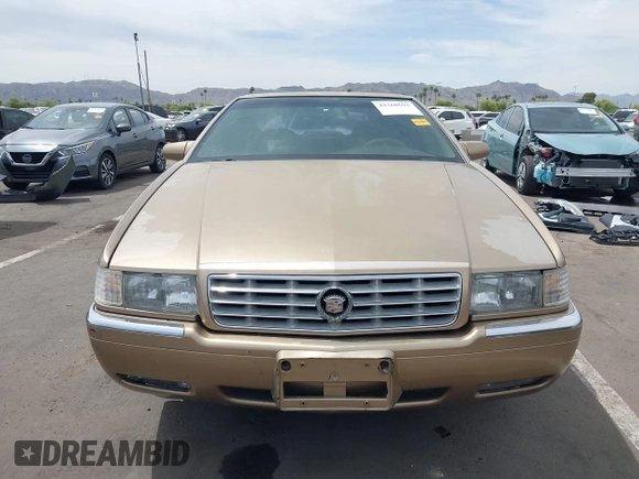 1999 Cadillac Eldorado ESC z VIN 1G6EL12Y5XU603764, wystawiony jako IAAI lot #42368692 z przebiegiem 154 613 mil mil oraz . Historia ofert i sprzedaży dostępna na DreamBid. Obrazek 12.