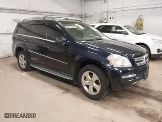 2011 Mercedes-Benz GL-Class GL 450 with VIN 4JGBF7BE4BA664500, listed as a IAAI auction lot 42099521 with 140,232 mi miles. Bid and sale history available at carsss.com. Image 1.