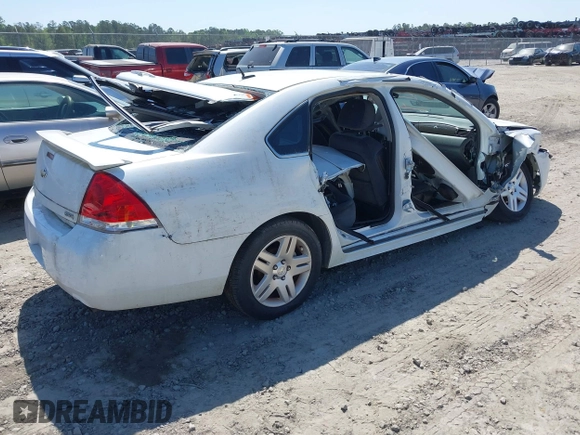 2014 Chevrolet Impala LT with VIN 2G1WB5E30E1136153, listed as a IAAI auction lot 39848599 with 126,676 mi miles and . Bid and sale history available at DreamBid. Image 4.