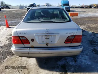 2000 Mercedes-Benz E-Class with VIN WDBJF82J5YX030071, listed as a Copart auction lot 42430025 with 122,612 mi miles and Salvage Title. Bid and sale history available at carsss.com. Image 6.
