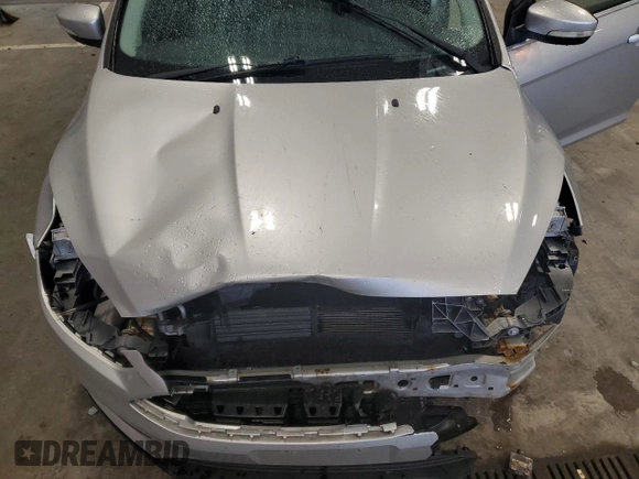 2015 Ford Focus Titanium с VIN 1FADP3N21FL253902, выставлен на аукционе Copart как лот 58278345 с пробегом 245 180 миль миль и На запчасти • Non repairable. История ставок и продаж доступна на DreamBid. Изображение 11.