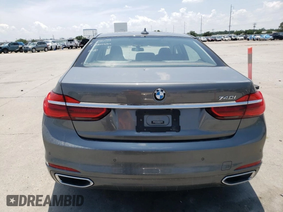 2019 BMW 7 Series 740i z VIN WBA7E2C56KB454602, wystawiony jako Copart lot #56591244 z przebiegiem Nie podano mil oraz Czysty tytuł • Clean title. Historia ofert i sprzedaży dostępna na DreamBid. Obrazek 6.