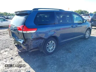 2014 Toyota Sienna XLE z VIN 5TDYK3DC9ES526117, wystawiony jako IAAI lot #42247546 z przebiegiem 119 096 mil mil oraz . Historia ofert i sprzedaży dostępna na DreamBid. Obrazek 4.
