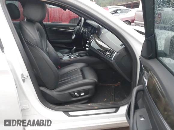 2018 BMW 5 Series 530e with VIN WBAJA9C52JB253501, listed as a IAAI auction lot 41010120 with 93,059 mi miles and . Bid and sale history available at DreamBid. Image 5.