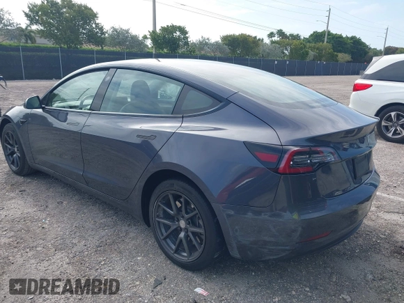 2023 Tesla Model 3 z VIN 5YJ3E1EA0PF403168, wystawiony jako IAAI lot #42002584 z przebiegiem 35 875 mil mil oraz . Historia ofert i sprzedaży dostępna na DreamBid. Obrazek 3.